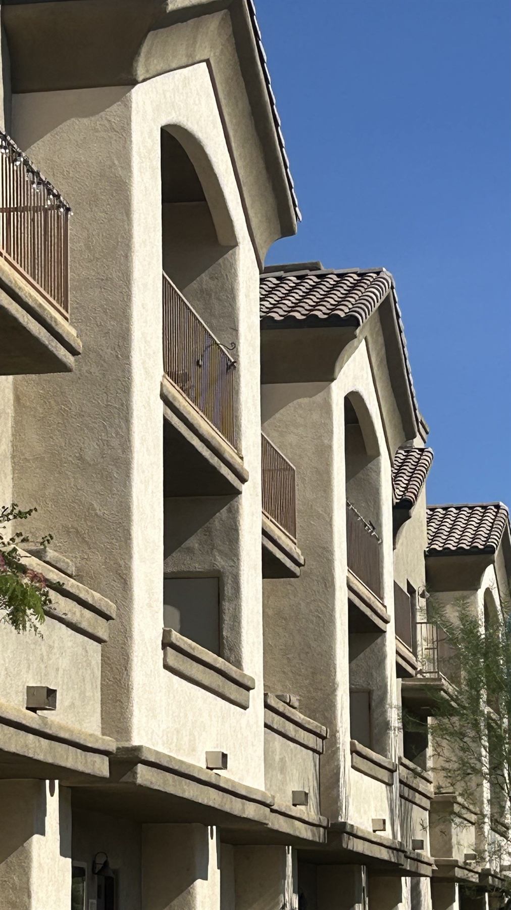 McCormick Luxury Apartments &mdash; arched balconies and tile roofline